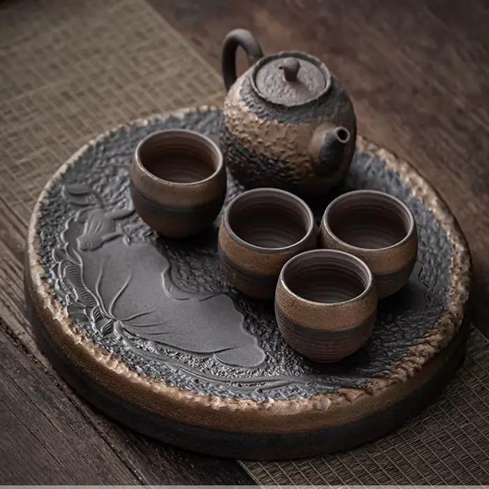 Service à thé Kung Fu en poterie brute de style japonais, plateau à thé en céramique, rangement de l'eau, Table à thé, théière rétro, tasse à thé