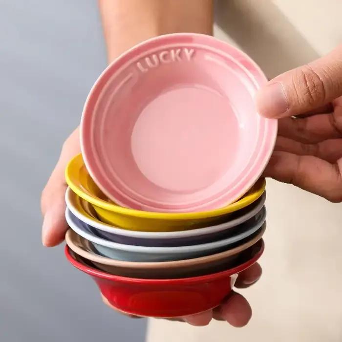 Petit plat rond en céramique nickel é