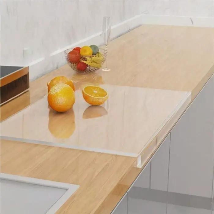 Planche à découper en acrylique avec rebord de protection