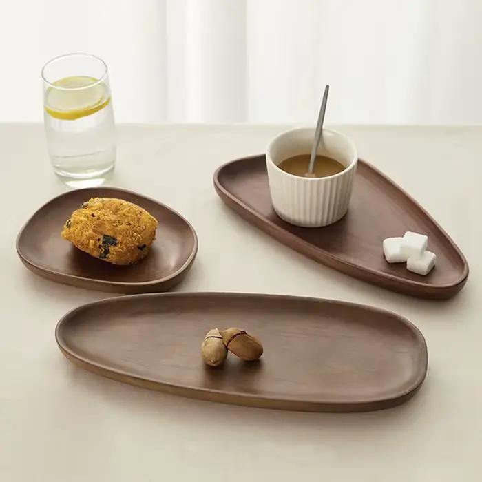 Assiettes en bois de noyer de style japonais HeMu - Plateaux de service ovales irréguliers