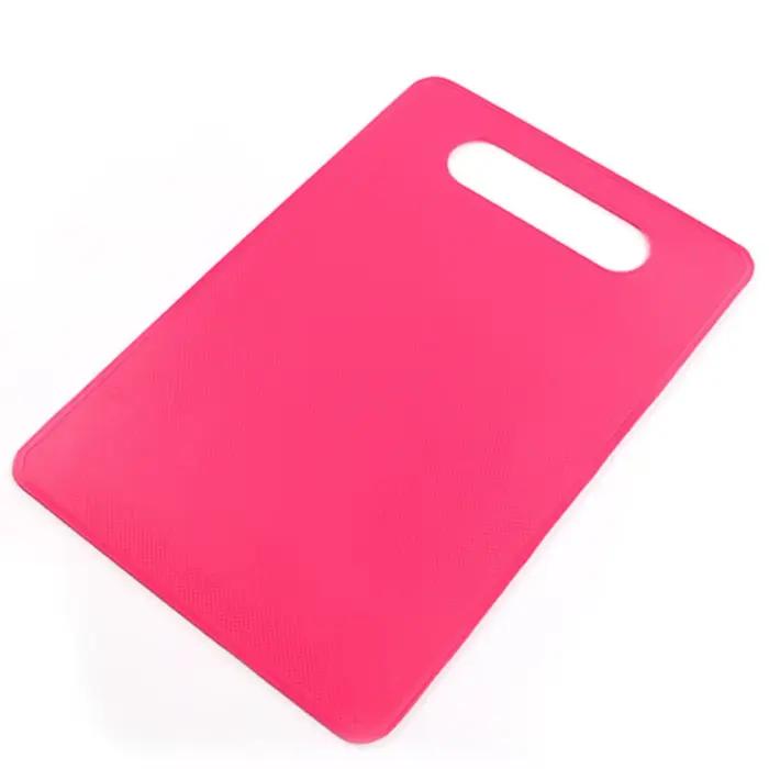 Planche à découper couleur bonbon en PP