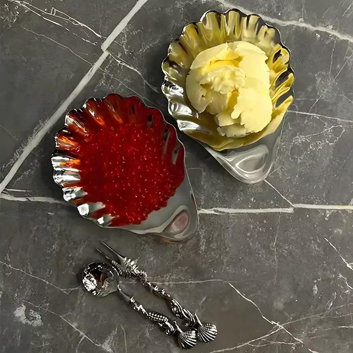 Assiette en acier inoxydable en forme de coquille