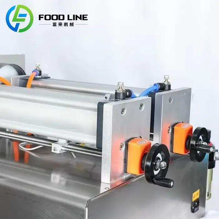 Système de remplissage de liquide manuel pour bouteilles, pots et conteneurs dans l'industrie alimentaire
