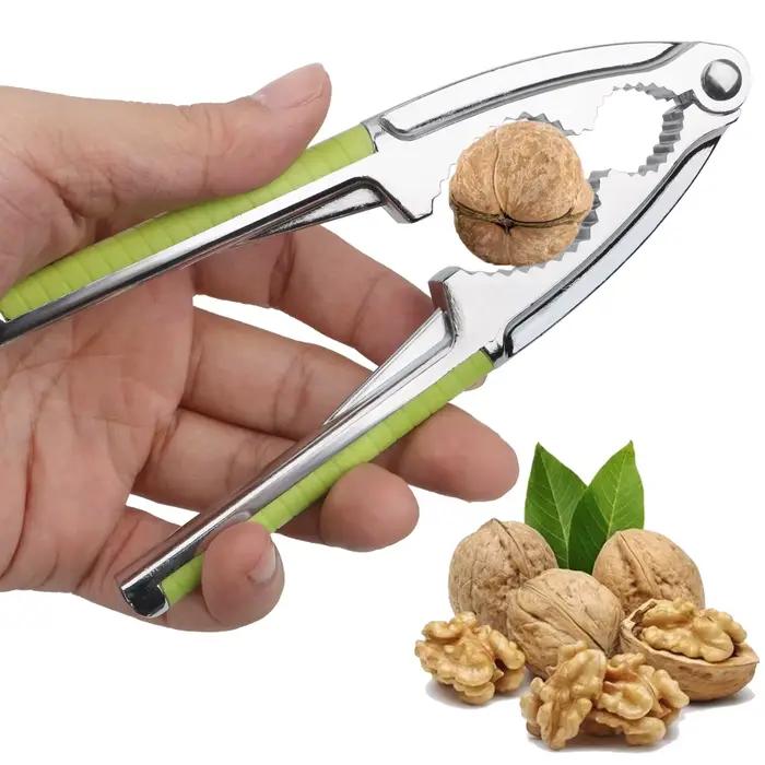 Pince à noix multifonctionnelle en acier inoxydable pour noix de pin noix de pécan et noisettes occasionnels usages conviviaux à offrir