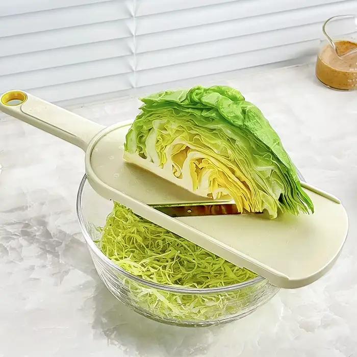 Coupe-légumes et râpe à chou