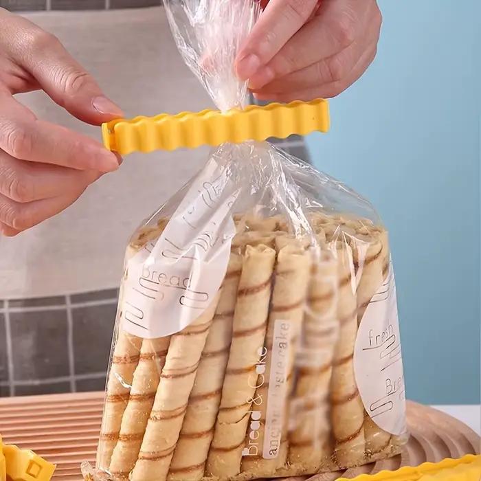 Clip de scellage en forme de friture française
