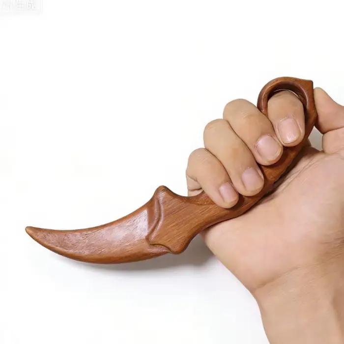 Couteau à griffes en bois de santal doré
