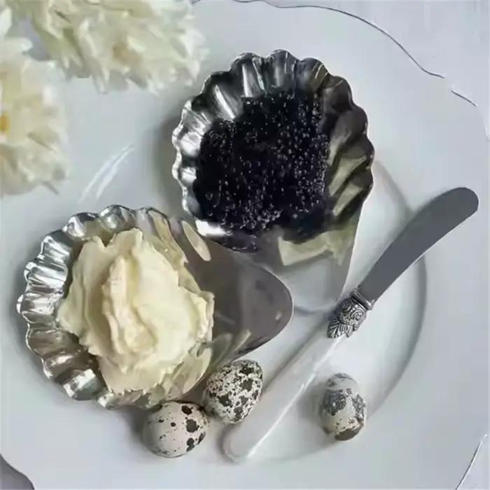 Assiette en acier inoxydable en forme de coquille