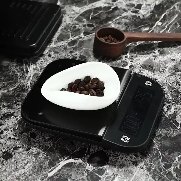 Tasse à mesurer les grains de café