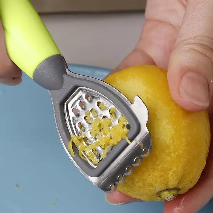 Zesteur de citron et presse-agrumes multifonctionnel lame en acier inoxydable poignée verte pour râper et presser agrumes en cuisine pour des saveurs fraîches et subtiles