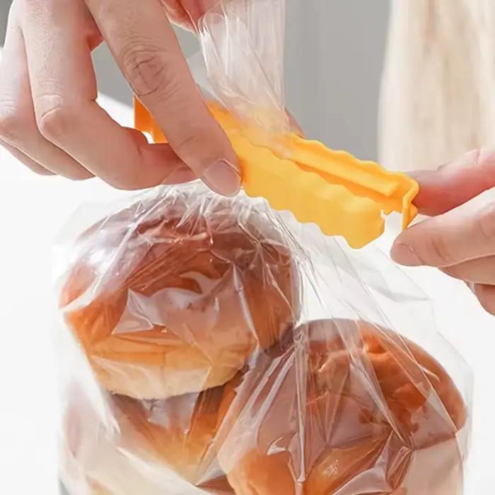 Clip de scellage résistant à l'humidité pour aliments, avec autocollant magnétique pour réfrigérateur, pince à collation à longue bande pour frites, cadeau créatif, 12 pièces/ensemble