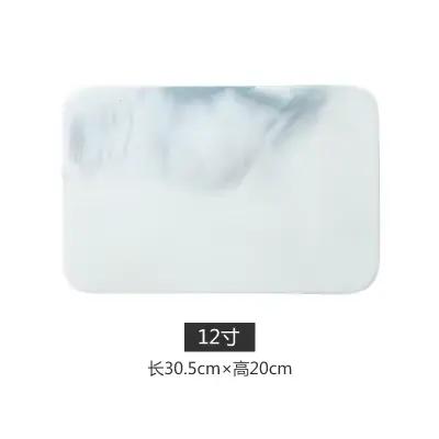 Planche à découper en marbre pour craquelins au fromage et sushi