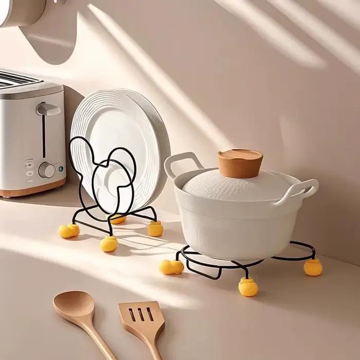 Support isolant pour cuisinière de cuisine