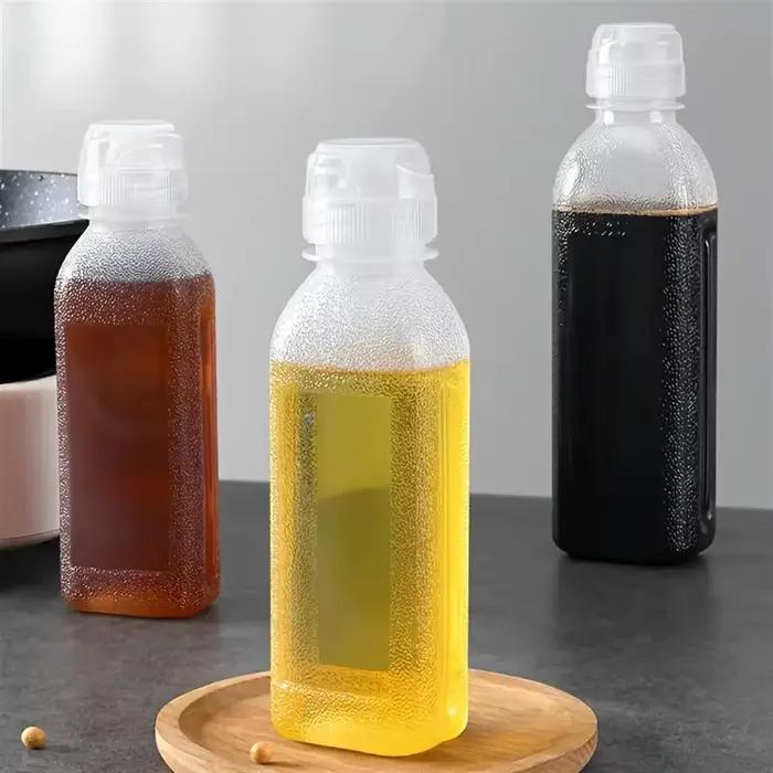 Bouteilles à huile et vinaigre en plastique ergonomiques pour huile, vinaigre, alcool, vin de cuisine et sauce soja pour cuisine ordonnée et sans gaspillage