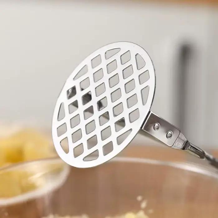 Poussoir de pommes de terre en acier inoxydable