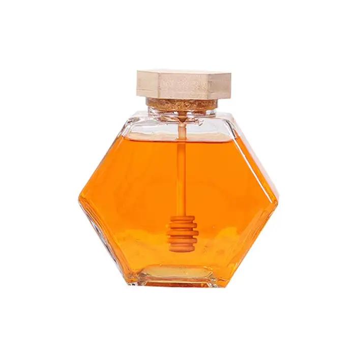 Bouteille de miel en verre hexagonale avec pot en bois
