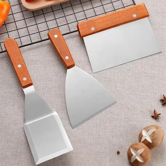 Grattoirs antiadhésifs en acier inoxydable