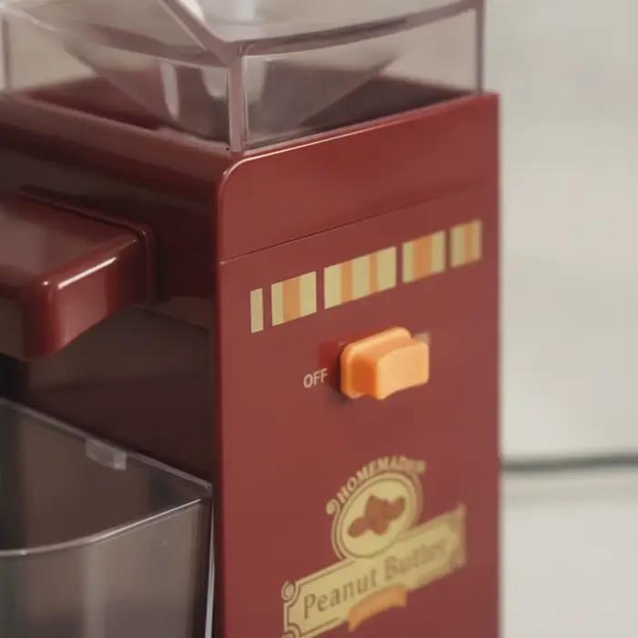 Machine à beurre de cacahuètes avec récipient de collecte