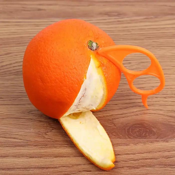 Éplucheur de fruits et d'oranges