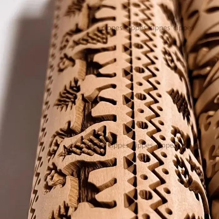 Rouleau à pâtisserie de noël avec motifs de fleurs de renne