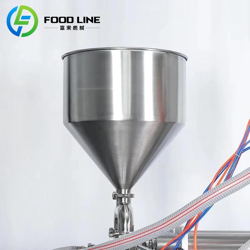 Système de remplissage de liquide manuel pour bouteilles, pots et conteneurs dans l'industrie alimentaire