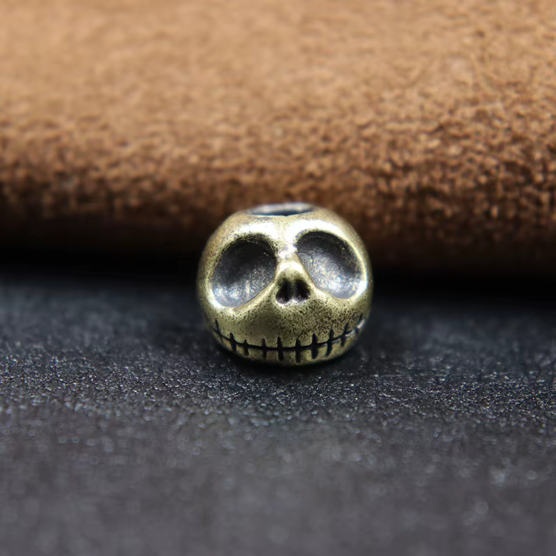 Couteau en laiton Punk citrouille crâne, perles, corde de parapluie, pendentif de couteau d'extérieu
