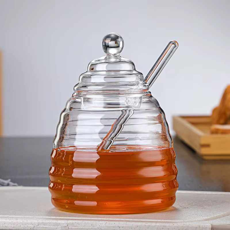 Récipient de stockage de miel précieux en accent d'abeille en verre avec louche et couvercle