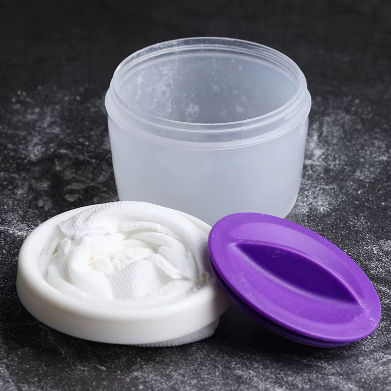 Bouffée de poudre antiadhésive